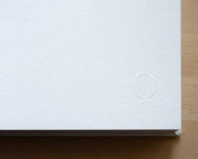 Album Authenticity & Quality Detail - Embossed Queensberry Logo